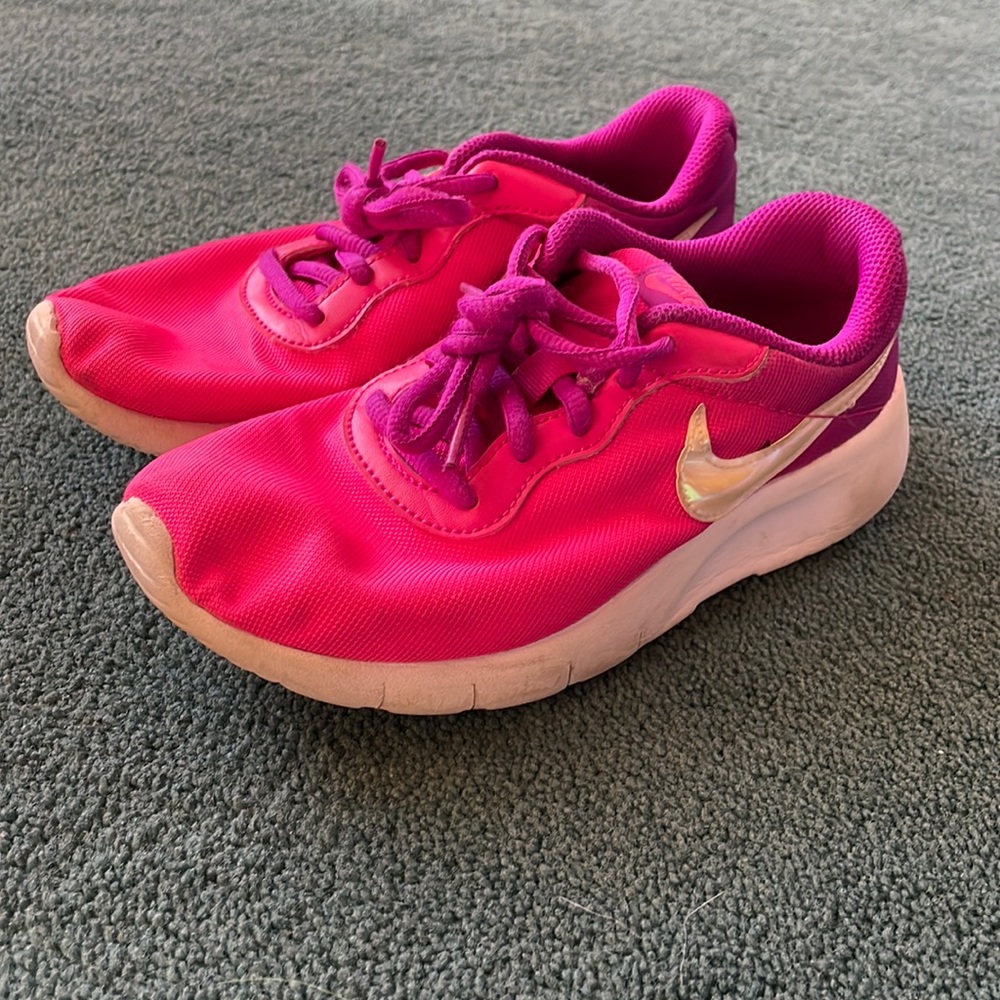 Gently used. Girls youth size 2 nikes.